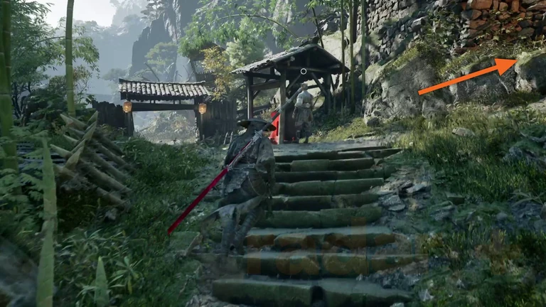 The uphill path to the right before the red shrine, towards the shack.